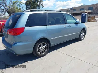 2006 Toyota Sienna XLE with VIN 5TDZA22CX6S555163, listed as a IAAI auction lot 41936624 with 230,825 mi miles. Bid and sale history available at carsss.com. Image 4.