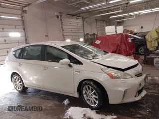 2014 Toyota Prius Two with VIN JTDZN3EU2E3302823, listed as a IAAI auction lot 41300542 with 169,847 mi miles and . Bid and sale history available at DreamBid. Image 13.