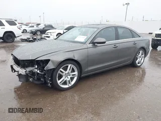 2014 Audi A6 Premium Plus z VIN WAUGFAFC3EN087176, wystawiony jako IAAI lot #42117602 z przebiegiem 53 571 mil mil oraz . Historia ofert i sprzedaży dostępna na DreamBid. Obrazek 18.