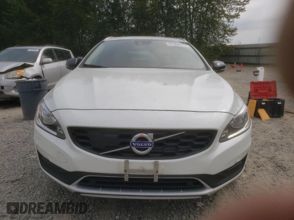 2018 Volvo V60 z VIN YV440MWK1J2051771, wystawiony jako Copart lot #67960674 z przebiegiem 49 782 mil mil oraz Szkoda całkowita • Salvage title. Historia ofert i sprzedaży dostępna na DreamBid. Obrazek 5.