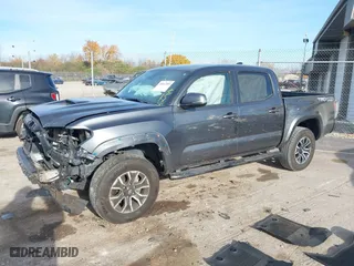 2023 Toyota Tacoma 4WD SR with VIN 3TMCZ5AN8PM574766, listed as a IAAI auction lot 40663003 with 43,978 mi miles. Bid and sale history available at carsss.com. Image 2.