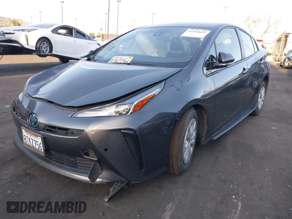 2020 Toyota Prius L Eco z VIN JTDKARFU9L3122010, wystawiony jako IAAI lot #41969655 z przebiegiem 76 250 mil mil oraz . Historia ofert i sprzedaży dostępna na DreamBid. Obrazek 2.