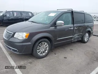 2015 Chrysler Town & Country Touring-L with VIN 2C4RC1CG9FR674238, listed as a IAAI auction lot 41908335 with 138,819 mi miles. Bid and sale history available at carsss.com. Image 2.