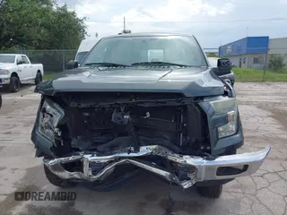 2015 Ford F-150 XLT with VIN 1FTEW1EG5FFA99713, listed as a IAAI auction lot 42481854 with 165,415 mi miles and . Bid and sale history available at DreamBid. Image 6.