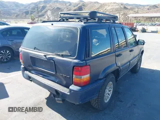 1993 Jeep Grand Cherokee Limited with VIN 1J4GZ78Y3PC579043, listed as a IAAI auction lot 42519218 with 76,547 mi miles and . Bid and sale history available at DreamBid. Image 4.