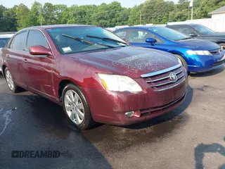 2005 Toyota Avalon XL z VIN 4T1BK36B95U046953, wystawiony jako IAAI lot #42409367 z przebiegiem 266 892 mil mil oraz . Historia ofert i sprzedaży dostępna na DreamBid. Obrazek 1.