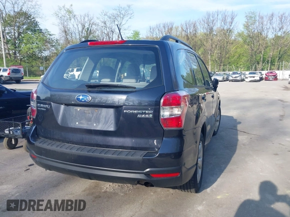 2015 Subaru Forester 2.5i with VIN JF2SJABCXFH599231, listed as a IAAI auction lot 42166220 with 60,409 mi miles and . Bid and sale history available at DreamBid. Image 21.