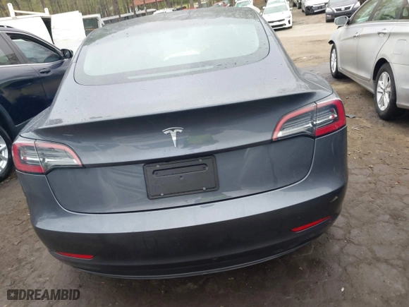 2023 Tesla Model 3 with VIN 5YJ3E1EA7PF642913, listed as a IAAI auction lot 41898249 with 26,394 mi miles. Bid and sale history available at carsss.com. Image 17.