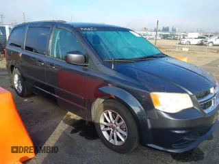 2014 Dodge Grand Caravan SXT with VIN 2C4RDGCG2ER267358, listed as a IAAI auction lot 41001692 with 186,763 mi miles and . Bid and sale history available at DreamBid. Image 1.