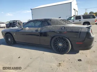 2016 Dodge Challenger R/T Scat Pack with VIN 2C3CDZFJ3GH202069, listed as a Copart auction lot 73378054 with 104,078 mi miles and Salvage Title. Bid and sale history available at carsss.com. Image 2.