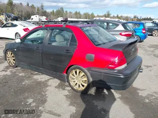 2003 Mitsubishi Lancer OZ-Rally with VIN JA3AJ86E03U078826, listed as a IAAI auction lot 41700333 with 119,656 mi miles. Bid and sale history available at carsss.com. Image 3.