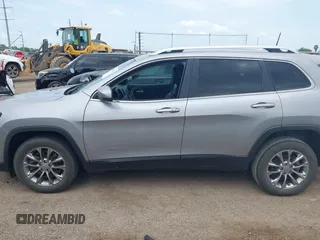 2021 Jeep Cherokee Altitude with VIN 1C4PJLLB2MD164004, listed as a IAAI auction lot 42083946 with 99,136 mi miles and . Bid and sale history available at DreamBid. Image 14.