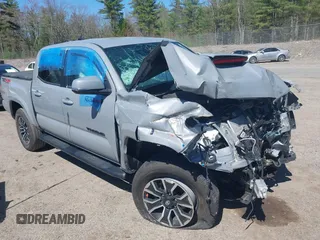 2020 Toyota Tacoma SR5 z VIN 3TMCZ5AN1LM353102, wystawiony jako IAAI lot #42163627 z przebiegiem 23 218 mil mil oraz . Historia ofert i sprzedaży dostępna na DreamBid. Obrazek 1.