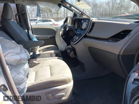 2017 Toyota Sienna with VIN 5TDDZ3DC9HS164773, listed as a IAAI auction lot 41811899 with 100,301 mi miles and . Bid and sale history available at DreamBid. Image 5.