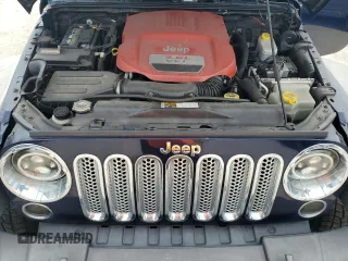 2013 Jeep Wrangler Unlimited Sport z VIN 1C4BJWDG7DL509796, wystawiony jako Copart lot #55787455 z przebiegiem 178 907 mil mil oraz Nie do naprawy • Non repairable. Historia ofert i sprzedaży dostępna na DreamBid. Obrazek 12.