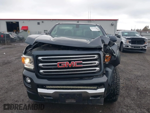 2016 GMC Canyon 4WD SLE with VIN 1GTG6CE37G1282630, listed as a IAAI auction lot 41153472 with 57,809 mi miles. Bid and sale history available at carsss.com. Image 12.