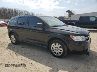 2014 Dodge Journey SE with VIN 3C4PDCABXET237156, listed as a Copart auction lot 50178125 with 137,292 mi miles and Salvage Title. Bid and sale history available at DreamBid. Image 4.
