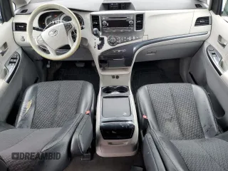 2011 Toyota Sienna SE with VIN 5TDXK3DC9BS135900, listed as a Copart auction lot 53864965 with 217,198 mi miles and Salvage Title. Bid and sale history available at DreamBid. Image 8.