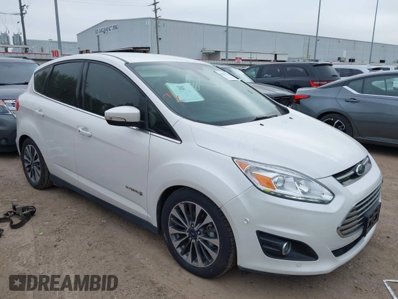 2018 Ford C-Max Titanium with VIN 1FADP5DUXJL104279, listed as a IAAI auction lot 41882275 with 55,137 mi miles and . Bid and sale history available at DreamBid. Image 1.