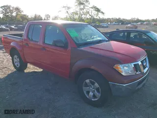 2009 Nissan Frontier SE with VIN 1N6AD07U19C419811, listed as a IAAI auction lot 41090904 with 141,119 mi miles. Bid and sale history available at carsss.com. Image 1.