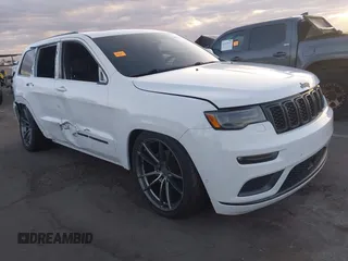 2018 Jeep Grand Cherokee Overland z VIN 1C4RJFCG7JC158464, wystawiony jako IAAI lot #42056386 z przebiegiem 94 608 mil mil oraz . Historia ofert i sprzedaży dostępna na DreamBid. Obrazek 1.
