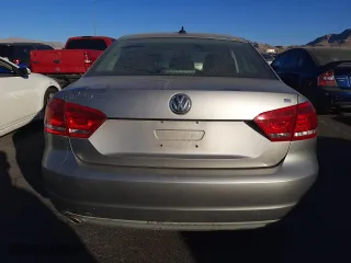 2012 Volkswagen Passat SE with VIN 1VWBP7A39CC054807, listed as a Copart auction lot 44277665 with 113,074 mi miles and Salvage Title. Bid and sale history available at carsss.com. Image 6.