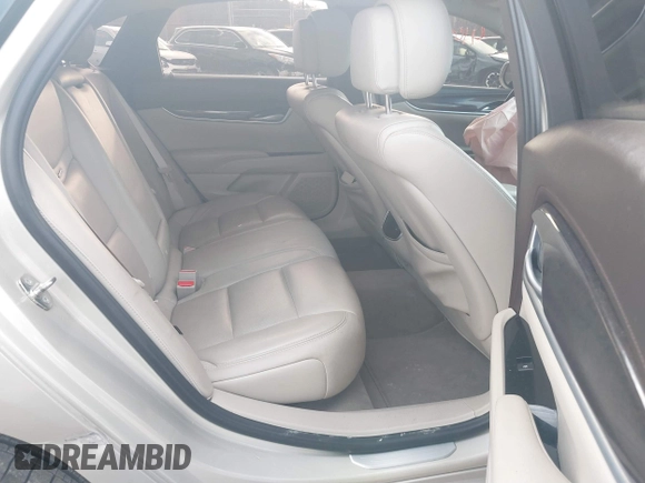 2014 Cadillac XTS Luxury z VIN 2G61M5S37E9304598, wystawiony jako IAAI lot #41006051 z przebiegiem 115 879 mil mil oraz . Historia ofert i sprzedaży dostępna na DreamBid. Obrazek 8.