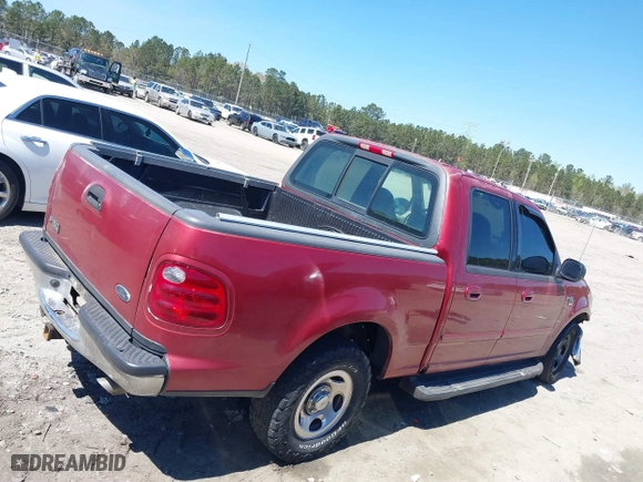 2001 Ford F-150 SuperCrew XLT with VIN 1FTRW07L11KE20412, listed as a IAAI auction lot 41877980 with 1 mi miles. Bid and sale history available at carsss.com. Image 15.