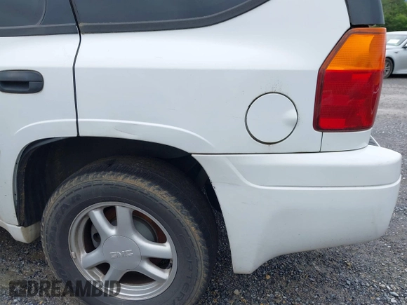 2006 GMC Envoy SLE z VIN 1GKDT13S562116159, wystawiony jako IAAI lot #42361666 z przebiegiem 243 466 mil mil oraz . Historia ofert i sprzedaży dostępna na DreamBid. Obrazek 12.
