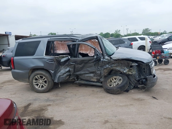 2020 Chevrolet Tahoe LS z VIN 1GNSCAKC3LR101733, wystawiony jako IAAI lot #41912918 z przebiegiem 153 731 mil mil oraz . Historia ofert i sprzedaży dostępna na DreamBid. Obrazek 13.