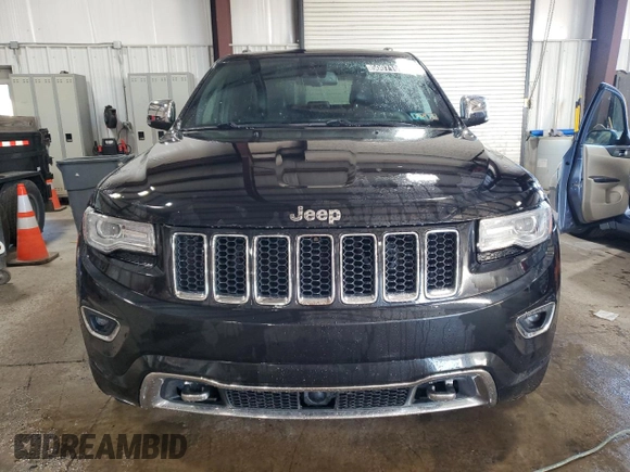 2014 Jeep Grand Cherokee Overland with VIN 1C4RJFCT9EC264594, listed as a Copart auction lot 50071695 with 124,712 mi miles and Clean Title. Bid and sale history available at DreamBid. Image 5.