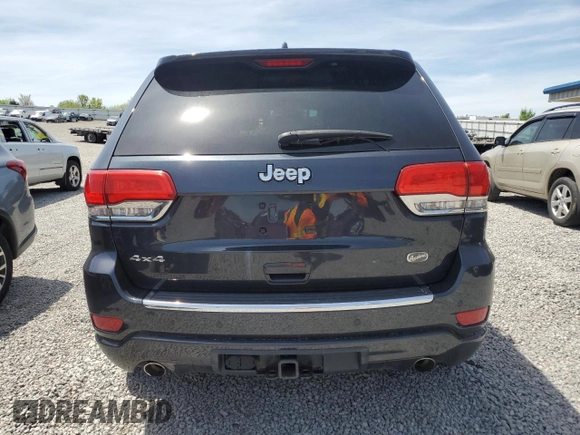 2016 Jeep Grand Cherokee Overland with VIN 1C4RJFCG9GC338165, listed as a Copart auction lot 54125815 with 102,302 mi miles and Salvage title. Bid and sale history available at DreamBid. Image 6.