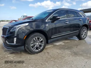 2021 Cadillac XT5 FWD Premium Luxury z VIN 1GYKNCRS0MZ173433, wystawiony jako Copart lot #55381055 z przebiegiem Nie podano mil oraz Nie do naprawy • Non repairable. Historia ofert i sprzedaży dostępna na DreamBid. Obrazek 1.