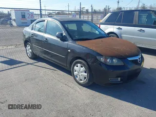 2009 Mazda 3 i Touring Value with VIN JM1BK32F091234569, listed as a IAAI auction lot 41696799 with 118,416 mi miles. Bid and sale history available at carsss.com. Image 1.