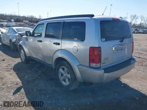 2007 Dodge Nitro SLT with VIN 1D8GT58K77W614092, listed as a IAAI auction lot 41645991 with 129,931 mi miles. Bid and sale history available at carsss.com. Image 3.