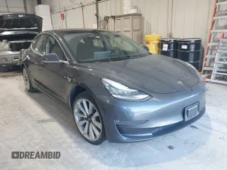 2018 Tesla Model 3 Long Range Battery with VIN 5YJ3E1EB1JF145520, listed as a IAAI auction lot 41360939 with 95,010 mi miles and . Bid and sale history available at DreamBid. Image 1.