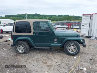 1999 Jeep Wrangler Sahara with VIN 1J4FY49S5XP482037, listed as a IAAI auction lot 42341723 with 161,081 mi miles and . Bid and sale history available at DreamBid. Image 14.