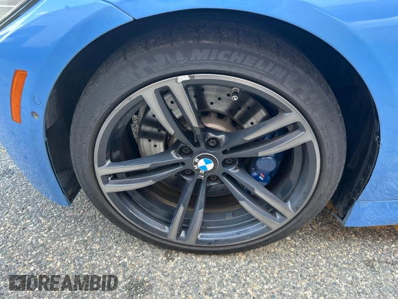 2015 BMW M4 with VIN WBS3U9C56FP967640, listed as a Copart auction lot 63641785 with 31,516 mi miles and Salvage title. Bid and sale history available at DreamBid. Image 11.