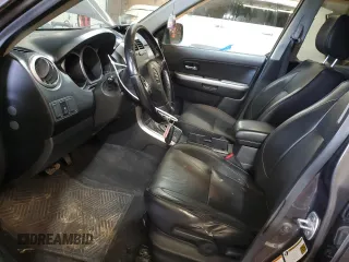 2012 Suzuki Grand Vitara Limited z VIN JS3TD0D79C4100640, wystawiony jako Copart lot #58167975 z przebiegiem 138 376 mil mil oraz Tytuł czysty. Historia ofert i sprzedaży dostępna na DreamBid. Obrazek 7.