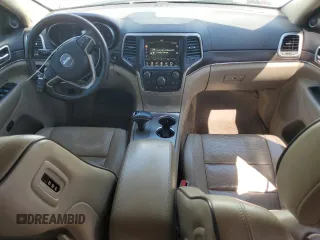 2015 Jeep Grand Cherokee Overland with VIN 1C4RJFCM4FC618516, listed as a Copart auction lot 58671455 with 221,550 mi miles and Clean title. Bid and sale history available at DreamBid. Image 8.