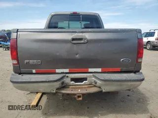 2004 Ford F-250 XL z VIN 1FTNX21P54EB05392, wystawiony jako Copart lot #57982065 z przebiegiem 244 312 mil mil oraz Czysty tytuł • Clean title. Historia ofert i sprzedaży dostępna na DreamBid. Obrazek 6.