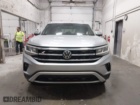 2023 Volkswagen Atlas SE z VIN 1V2KC2CA6PC210593, wystawiony jako IAAI lot #41957633 z przebiegiem 34 801 mil mil oraz . Historia ofert i sprzedaży dostępna na DreamBid. Obrazek 13.