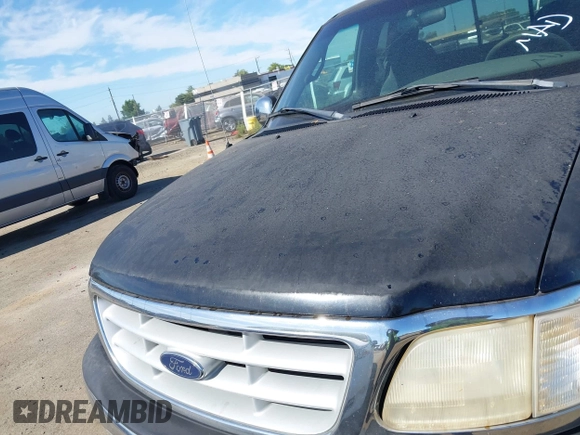 1999 Ford F-150 XL with VIN 2FTRX17L7XCA75886, listed as a IAAI auction lot 42831089 with Not provided miles and . Bid and sale history available at DreamBid. Image 6.
