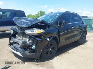 2020 Chevrolet Trax LT with VIN KL7CJLSB9LB013376, listed as a IAAI auction lot 42272291 with 103,766 mi miles and . Bid and sale history available at DreamBid. Image 2.