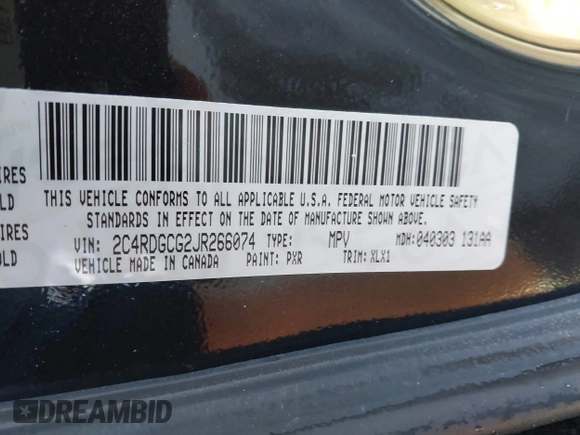 2018 Dodge Grand Caravan SXT with VIN 2C4RDGCG2JR266074, listed as a IAAI auction lot 40545630 with 98,036 mi miles and . Bid and sale history available at DreamBid. Image 9.