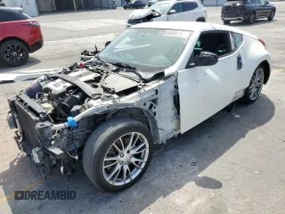 2013 Nissan 370Z with VIN JN1AZ4EH9DM381266, listed as a Copart auction lot 59989515 with 170,900 mi miles and Salvage title. Bid and sale history available at DreamBid. Image 1.