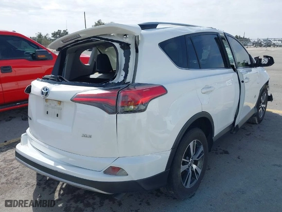 2018 Toyota RAV4 XLE with VIN JTMWFREV0JD132042, listed as a IAAI auction lot 41578567 with 102,365 mi miles. Bid and sale history available at carsss.com. Image 4.