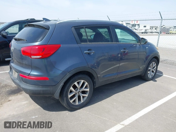 2014 Kia Sportage LX with VIN KNDPBCAC2E7648831, listed as a IAAI auction lot 41963773 with 118,399 mi miles and . Bid and sale history available at carsss.com. Image 4.