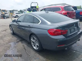 2019 BMW 4 Series 440i xDrive with VIN WBA4J7C5XKBM75920, listed as a IAAI auction lot 42481184 with 101,887 mi miles and . Bid and sale history available at DreamBid. Image 3.