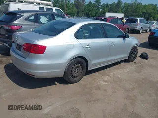 2013 Volkswagen Jetta SE with VIN 3VWDX7AJ3DM404990, listed as a IAAI auction lot 42584934 with 164,126 mi miles and . Bid and sale history available at DreamBid. Image 4.